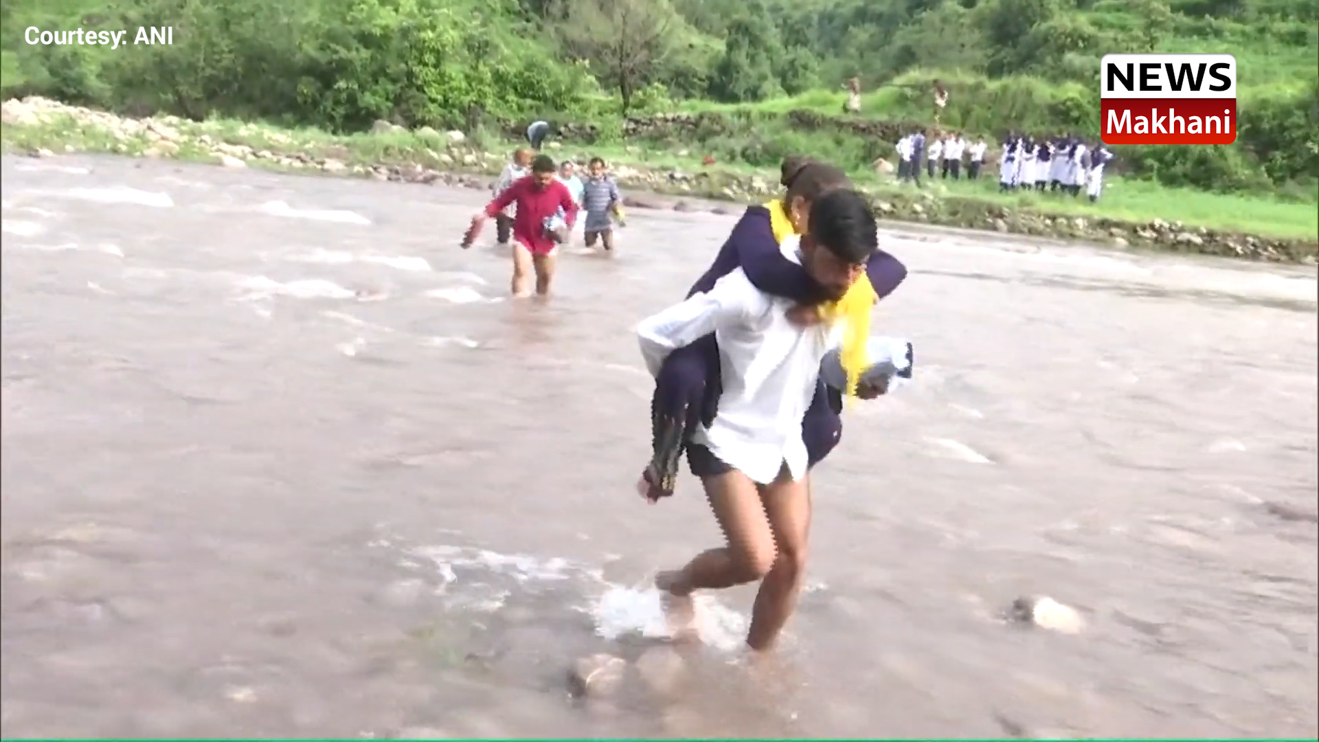 School students cross river stream on feet in absence of a bridge in J&K’s Rajouri