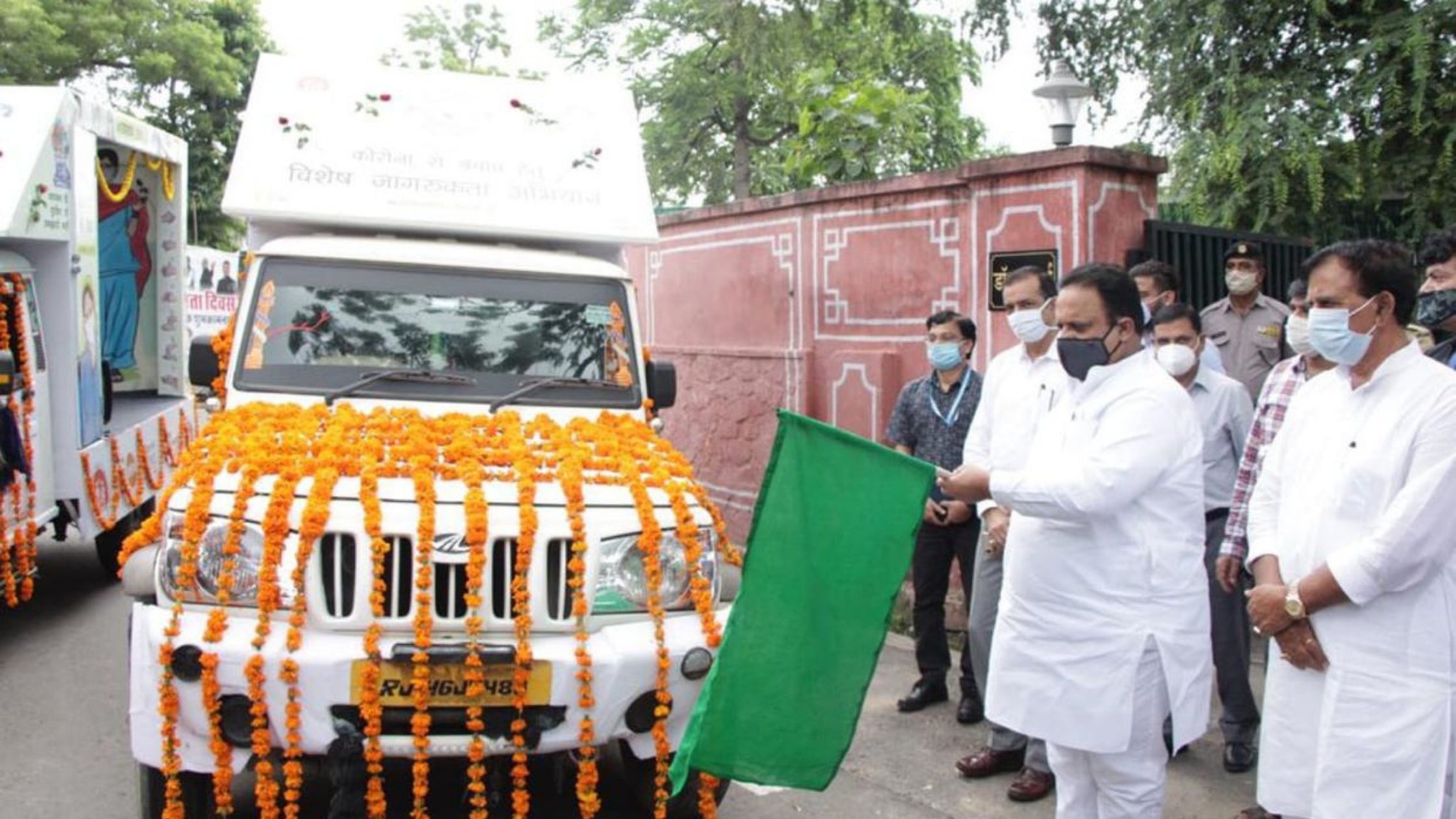 Health Minister Dr Raghu Sharma flagged of vehicle 1 Health Minister Dr Raghu Sharma flagged off ‘Campaign Communication Vehicles’