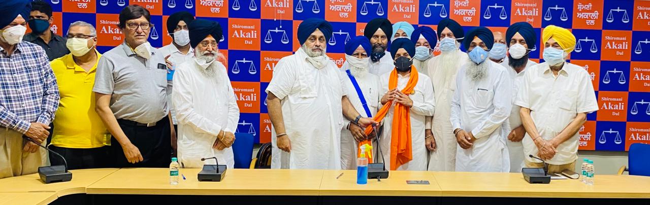 Photo S. Paramjit Singh Dhillon with S. Sukhbir Singh ji Badal